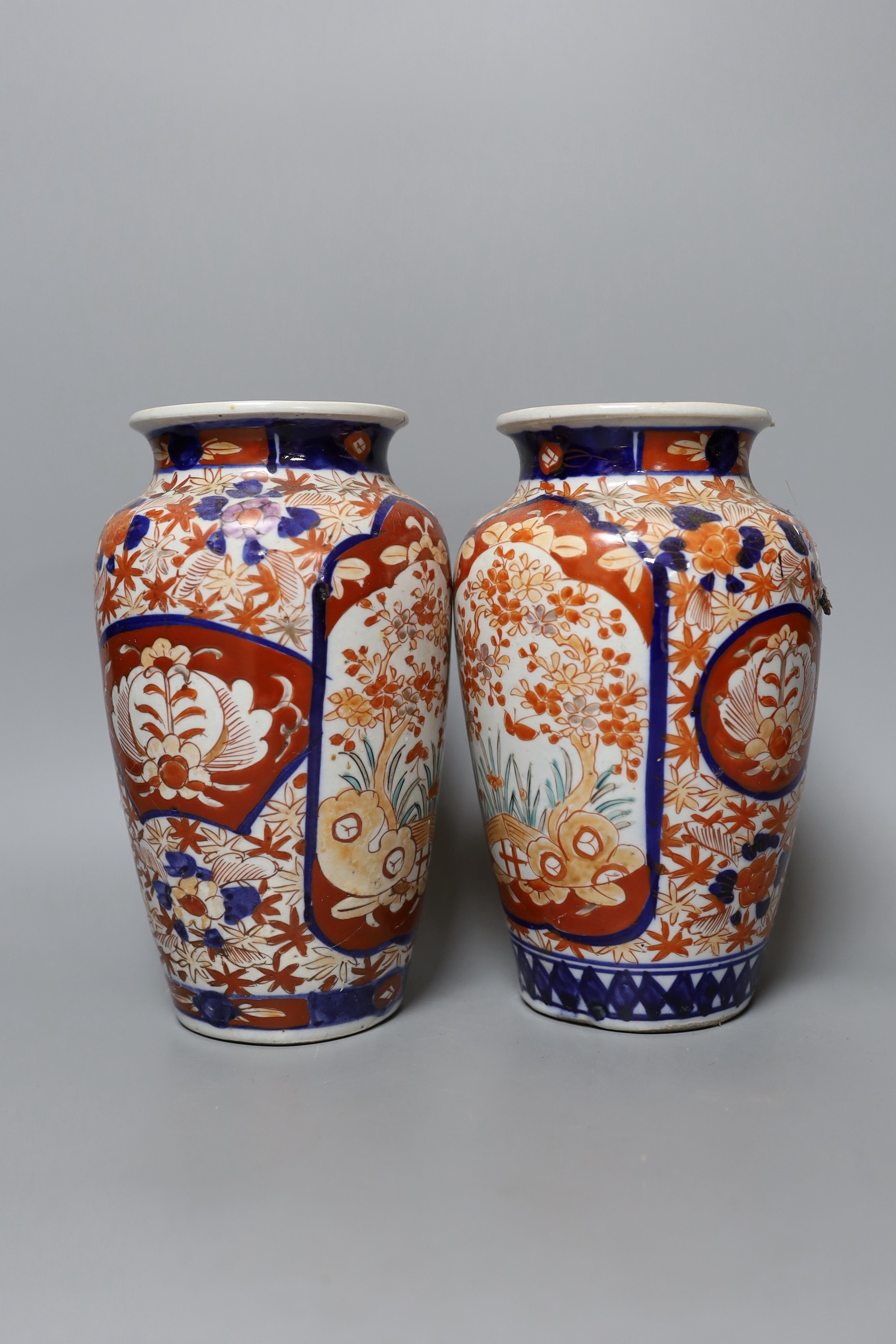 A 19th century Imari lobed dish and a pair of Imari vases, tallest 21cm